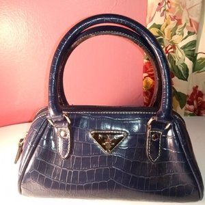 BLUE NYC HANDBAG TRIMMED IN SILVER HARDWARE AND DOUBLE ZIPPERS
